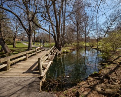 The Duck Pond and wooden pedestrian footbridge near Solitude. 