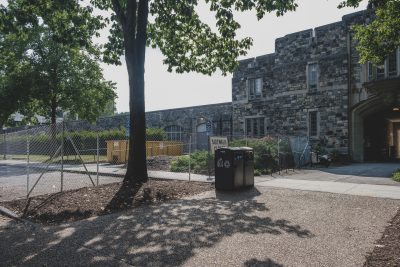 View of the exterior of Holden Hall as it undergoes demolition.