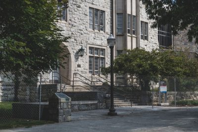 View of the exterior of Holden Hall as it undergoes demolition.