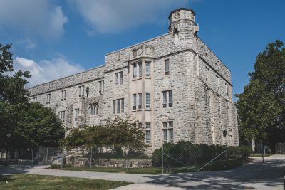 View of the exterior of Holden Hall as it undergoes demolition.