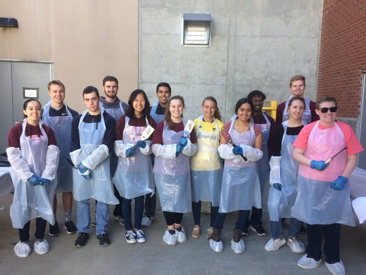 Student volunteers who helped sort through trash for a Waste Audit to discover where contamination in the waste stream is happening. 