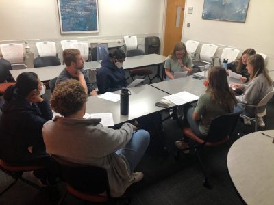 People sitting around a conference table