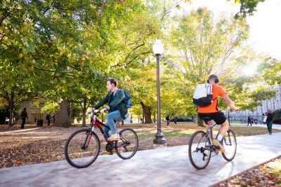 Two bicyclists on Virginia Tech's campus