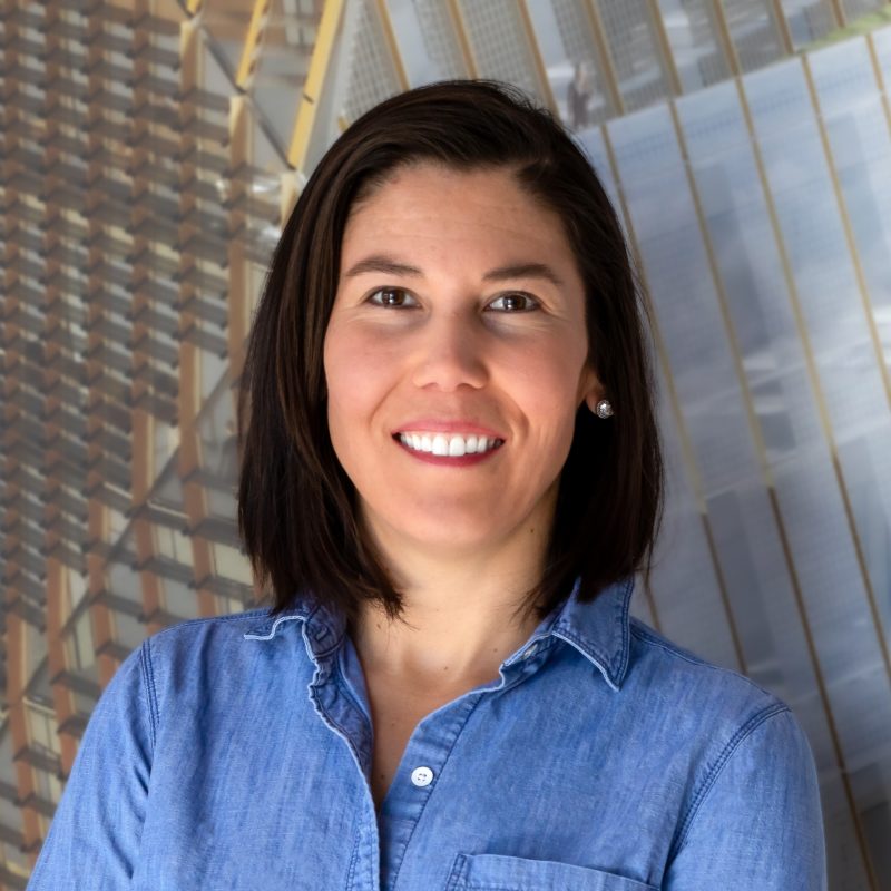 A 1x1 portrait of Stephanie Rollow against a blurred Innovation Campus background