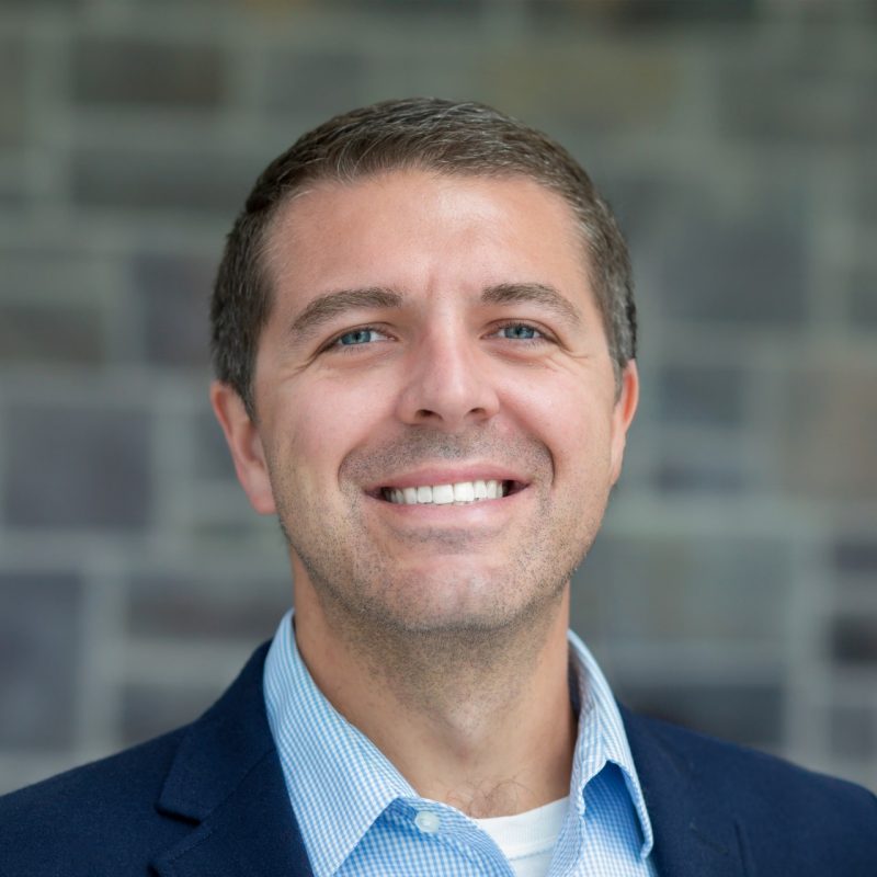 A 1x1 portrait of Kyle White against a Hokie Stone background