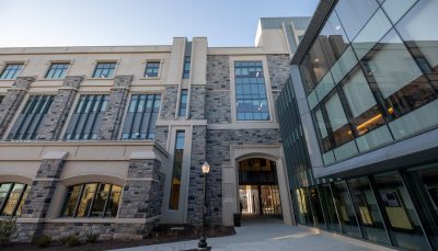 A newly constructed building on campus with lots of windows