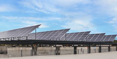 solar panels against a blue sky atop the Perry Street garage