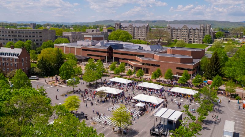 Aerial view of the people and large tents at the International Street Fair.