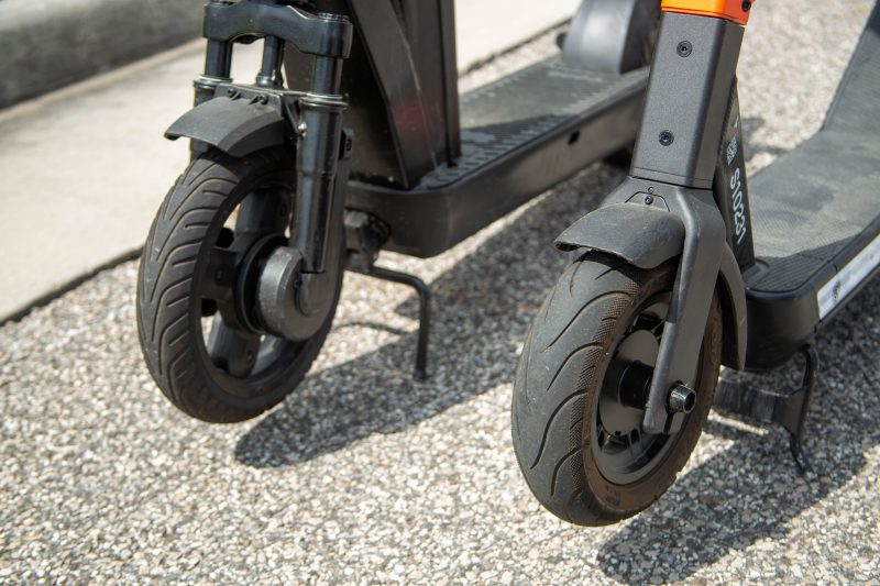 Two e-scooter wheels side-by-side