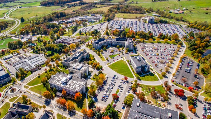 Fall foliage surrounds the main parking lots along Washington Street and Duck Pond Drive on the Blacksbug campus. 
