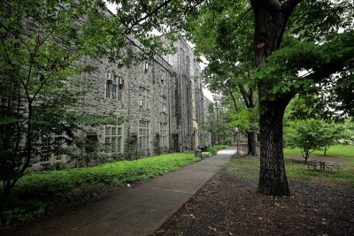Grey Hokie Stone Seitz Hall on a summer evening. 