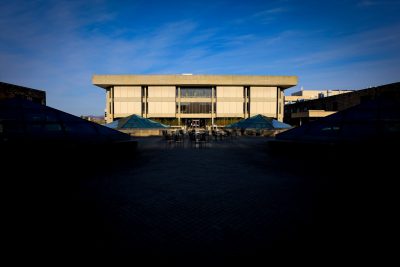 Cowgill Hall under blue skies.