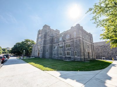 Grey Hokie Stone War Memorial Hall in the sunlight. 