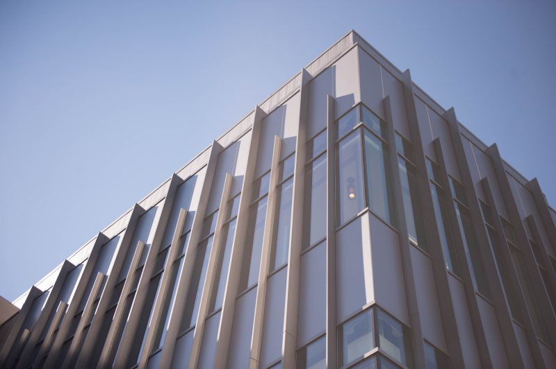 The top corner of Classroom Building featuring intricate windows. 